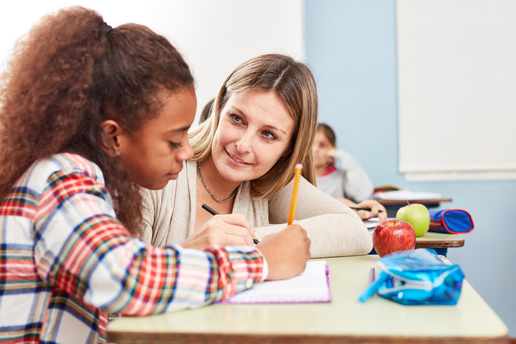 Woman as Teacher Gives Schoolgirl Tutoring